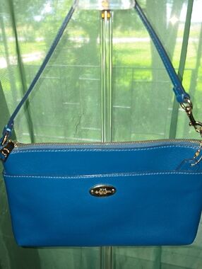 Coach Bright Blue Cross grain Leather Wristlet